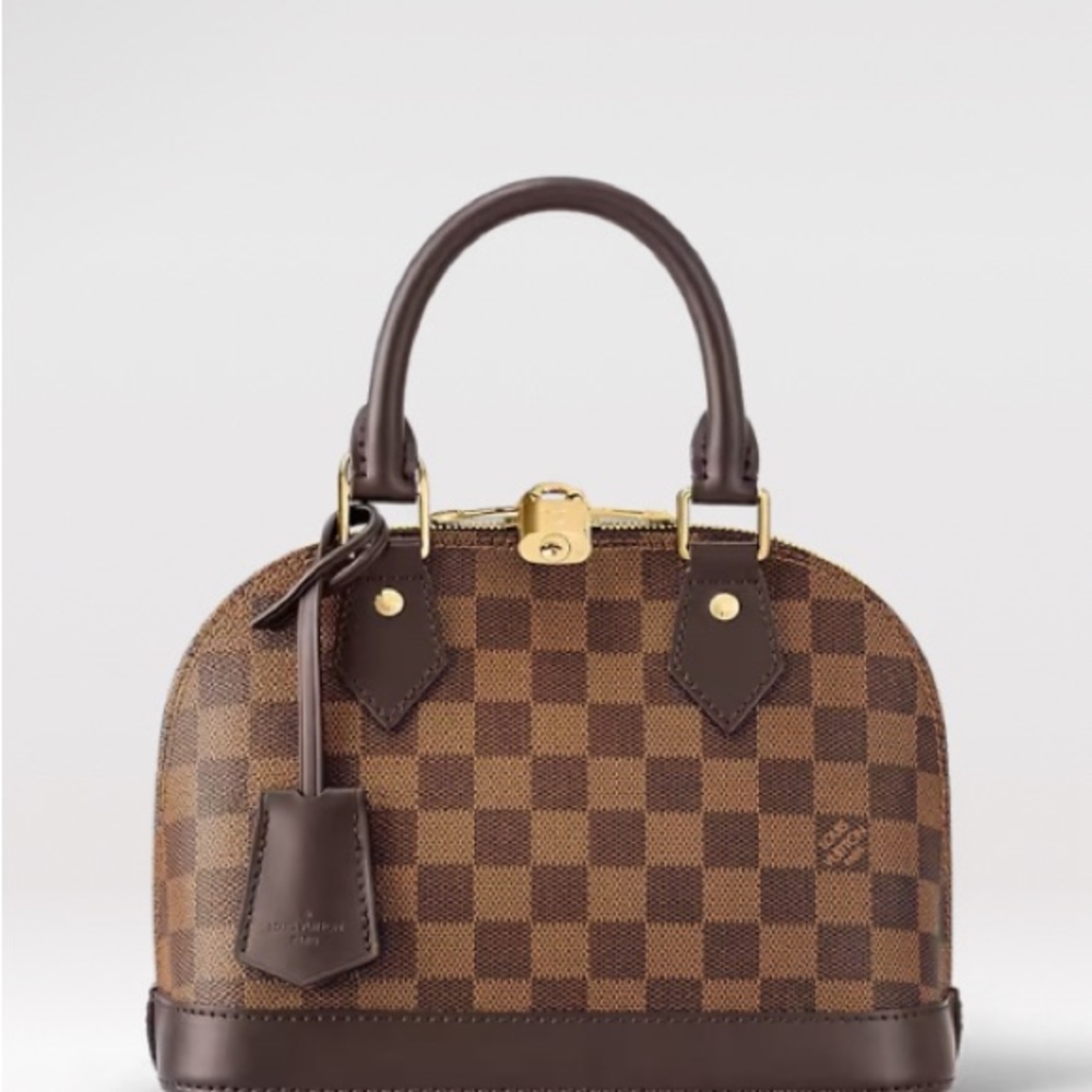 Louis Vuitton Alma BB. Used twice only. Like brand new.